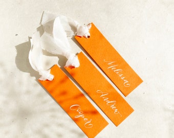 Vibrant modern wedding place name cards with silk ribbon (optional) in a light and graceful calligraphy style