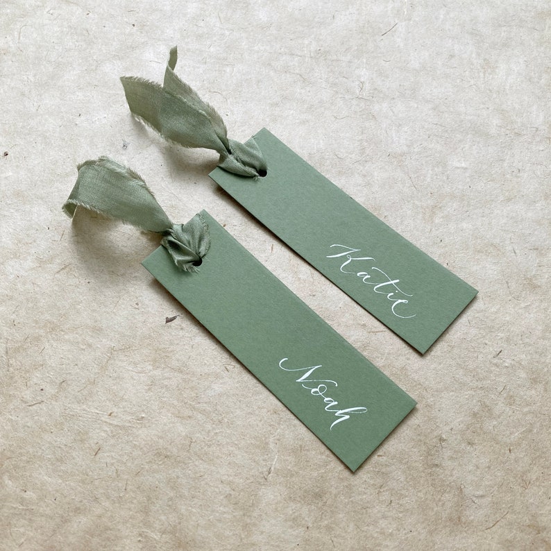 Elegant sage green wedding place names image 2