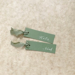 Elegant sage green wedding place names image 5