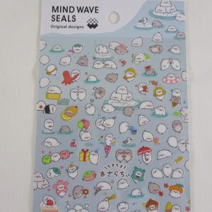 May include: Sheet of Mind Wave Seals stickers with original designs. The stickers feature various cartoon seals in different poses and with accessories, set against a light blue background.