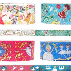 May include: Assortment of decorative washi tapes featuring a whimsical ballet theme. The tapes feature illustrations of ballerinas, flowers, and gold accents on a variety of colored backgrounds, including white, blue, pink, and red.