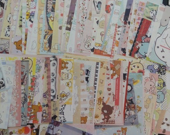 Op de afbeelding: Een verzameling kleurrijke, gepatroneerde papieren vellen met schattige cartoonfiguren. De vellen zijn perfect voor scrapbooking, kaart maken en andere knutselprojecten.