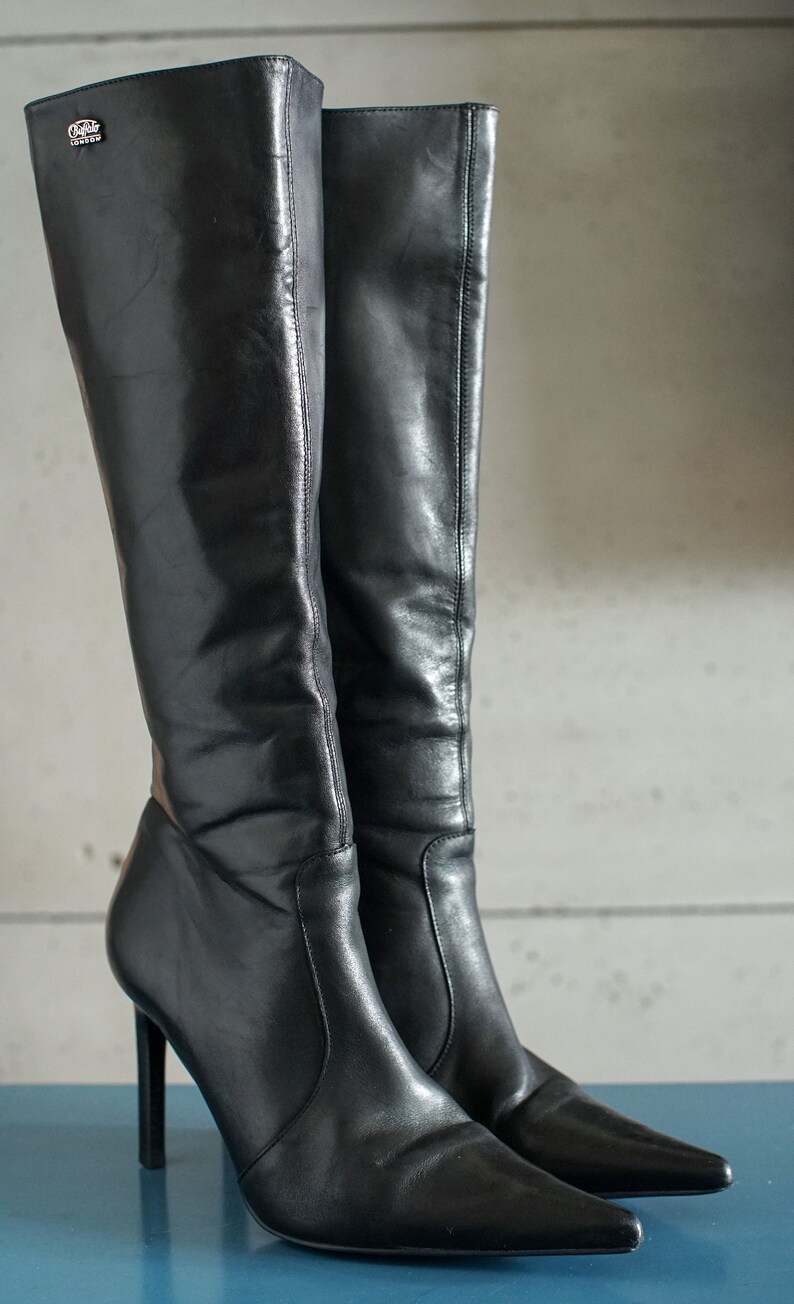 pointy knee high boots