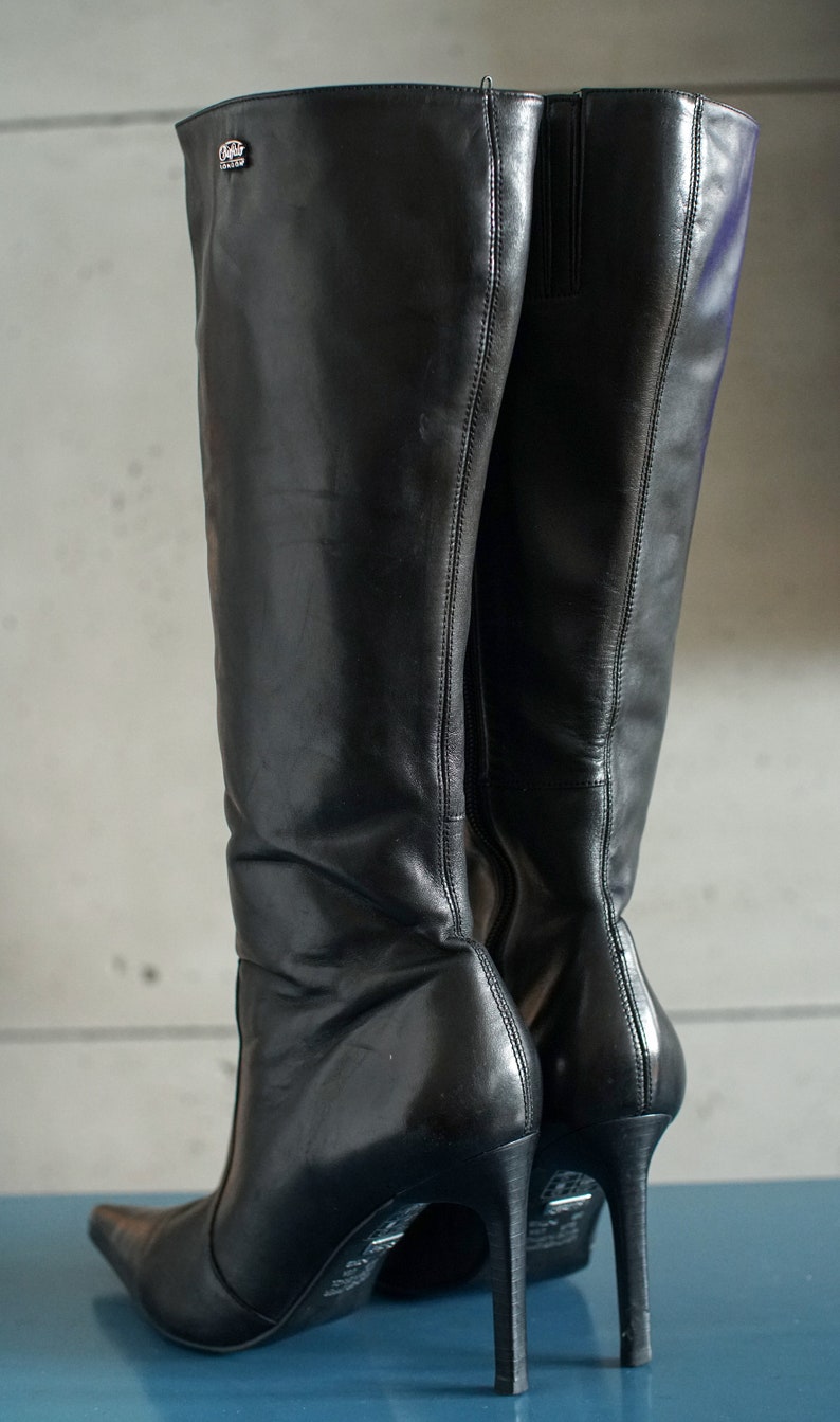 pointy knee high boots