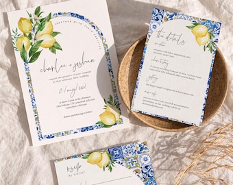 May include: A wedding invitation suite featuring a white card with a blue and white tile border, yellow lemon illustrations, and black text reading Charlee + Joshua, 29/aug/2027, the details, and rsvp. The set includes a main invitation, a details card, and an rsvp card.