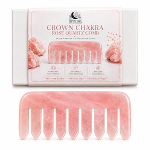 May include: A pink rose quartz comb with a rounded handle and seven teeth, displayed with its white box. The box features the text "CROWN CHAKRA ROSE QUARTZ COMB" and images of rose quartz crystals. The comb is designed for scalp massage and detangling.