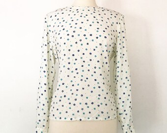 Crema Pendleton vintage y blusa estampada