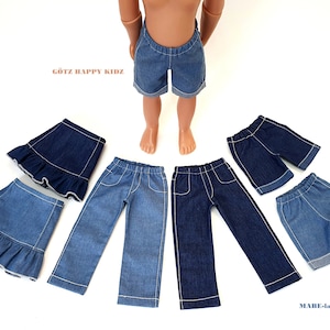 May include: A set of five denim clothing items for dolls, including a pair of shorts, a pair of pants, a skirt, and two ruffled skirts. The clothing is all blue denim with white stitching.