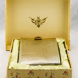 Billetera plegable Billpak dorada de mediados del siglo XX, estilo vintage de los años 50, para mujer, en su caja original.
