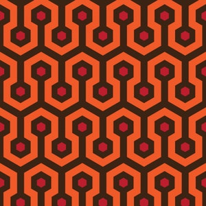 May include: A repeating pattern of orange and brown hexagons with red circles in the center of each hexagon. The pattern is a classic design often seen in vintage hotels and motels.