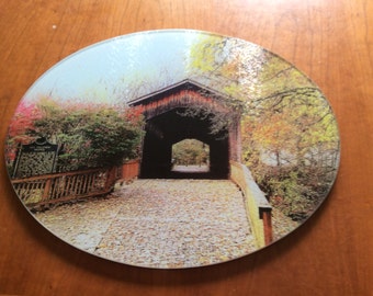 Covered bridge glass cutting board 12 inch round