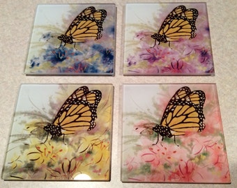 Beautiful glass  butterfly coaster set in 4 gorgeous colors and coaster holder too!