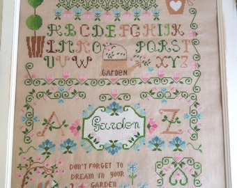 Muestrario de jardín que incluye texto en inglés, italiano, francés y español.