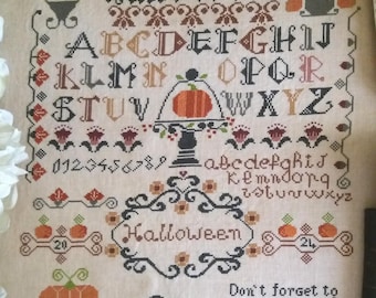 Muestra de Halloween que incluye escritura en inglés, italiano, francés y español.