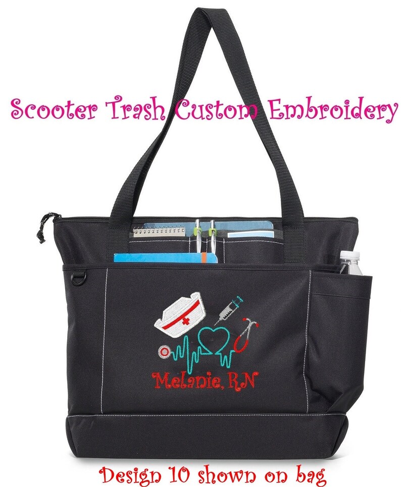 May include: Black tote bag with white stitching and multiple pockets. The bag features an embroidered design of a nurse's cap, a heart with a pulse line, a syringe, and a stethoscope. The name "Melanie, RN" is embroidered in red. The text "Scooter Trash Custom Embroidery" is above the bag.