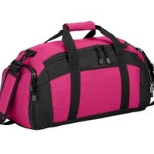 May include: A pink and black duffel bag with a zippered top and a shoulder strap.