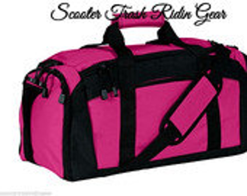 May include: A pink and black duffel bag with a zippered top and a shoulder strap.