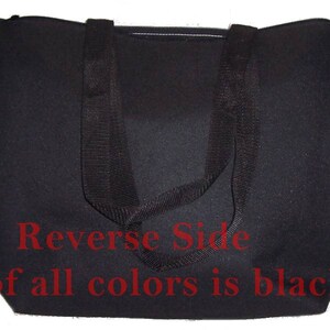 May include: Black tote bag with two long black straps. The text "Reverse Side of all colors is black" is printed on the bag.