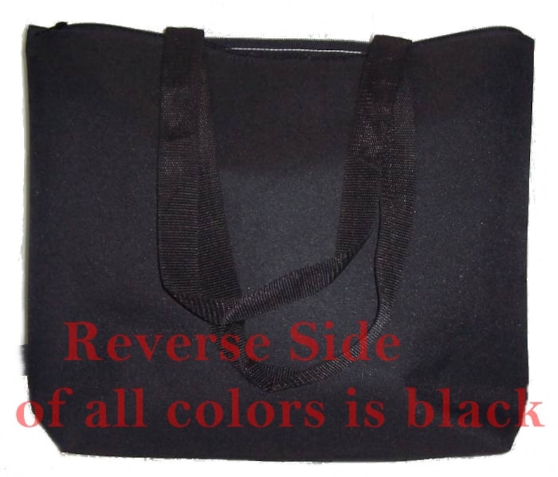 May include: Black tote bag with two long black straps. The text "Reverse Side of all colors is black" is printed on the bag.
