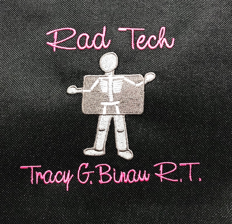 May include: A black bag with pink embroidery that reads "Rad Tech" and "Tracy G. Binau R.T."  A cartoon skeleton holding an x-ray is embroidered in the center.
