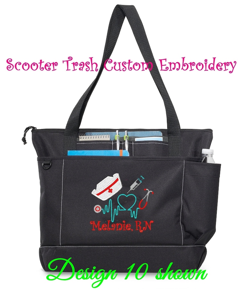 May include: Black tote bag with white stitching and a nurse-themed embroidered design. Features a nurse's cap, heartbeat, stethoscope, and syringe. The text "Melanie, R.N." is embroidered in red. The bag has multiple pockets and the text "Design 10 shown".