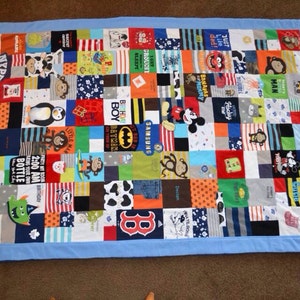 54"X72" Memory Blanket made from babies first-year(s) clothing. This blanket requires 65-70 clothing items.