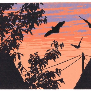 May include: Silhouette of a house with a chimney against a sunset sky. Three bats fly in the orange and purple sky. The silhouette of a tree is in the foreground.
