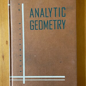May include: A brown book with the title "Essentials of Analytic Geometry" printed in white and teal on the cover.
