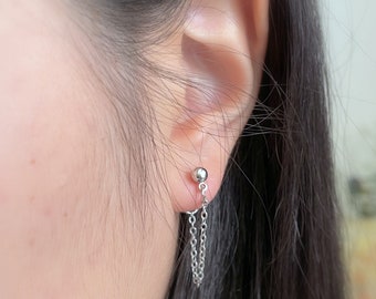 77)Piercing stud ball with chain dangle earrings.