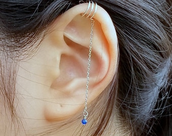 172) Geen piercing-oormanchet met driedubbele band en Capriblauwe Swarovski-kristallen ketting