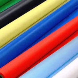May include: Rolls of colorful mesh fabric in green, black, yellow, blue, red, light blue, and white.
