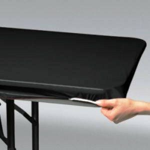 May include: Black rectangular table cover with a smooth, shiny finish. The cover is being pulled back to reveal the table legs.