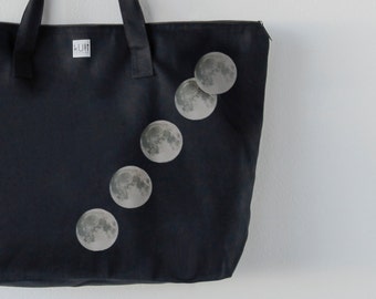 Black Canvas Tote Bag with Ascending Moon Design