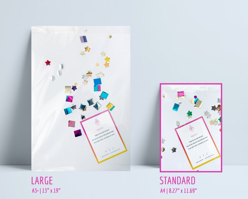 May include: Two white sheets of paper with colorful confetti scattered on them. The paper on the left is larger than the paper on the right. Both sheets of paper have a small card with text on them. The text on the card reads "Thank you for your purchase. We hope you love your new print. Please tag us on social media if you share a photo of your print.  We love seeing your creations!" The text below the larger sheet of paper reads "LARGE A3+ | 13" x 19" ". The text below the smaller sheet of paper reads "STANDARD A4 | 8.27" x 11.69" ".