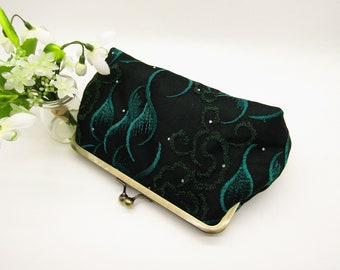 dark green clutch