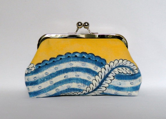 navy and yellow clutch bag