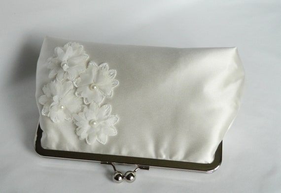 navy and ivory clutch bag