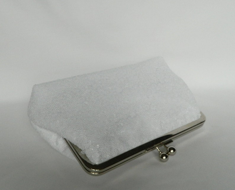 white sequin clutch