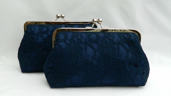 navy and silver clutch bag