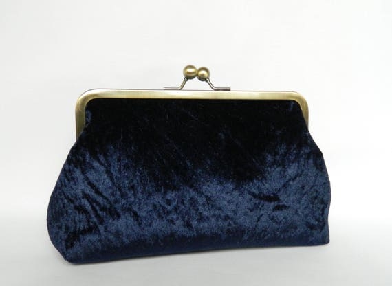 navy and white clutch bag