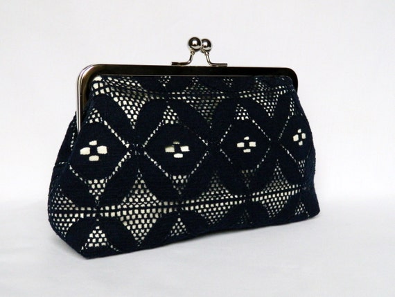 navy and ivory clutch bag