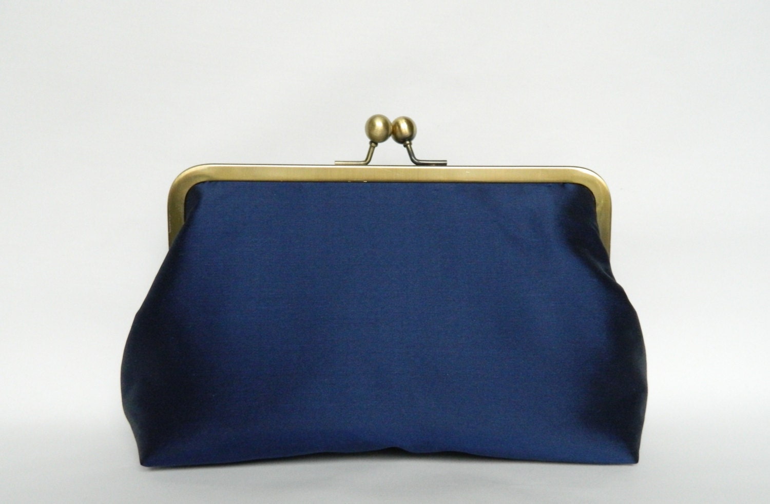 Metallic blue top clutch bag