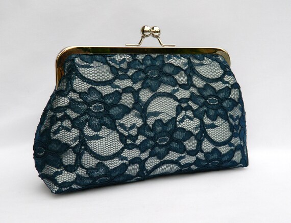 navy and silver clutch bag