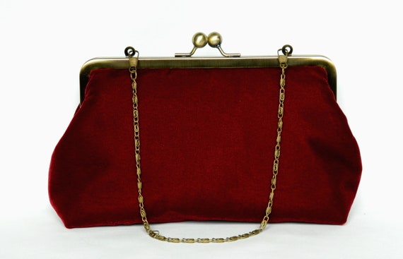 maroon clutch bag