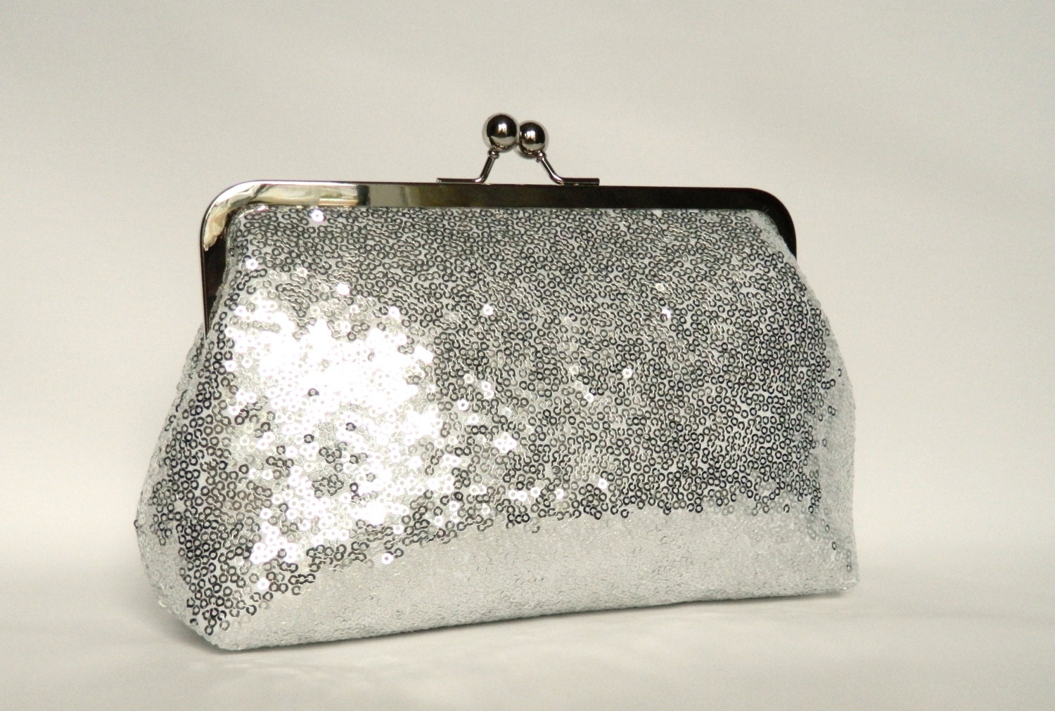 silver sequin clutch
