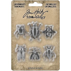 May include: A package of six insect-themed adornments. The package includes a variety of detailed metal bug embellishments, including a beetle, a cicada, and a bee. The package is labeled with the text "ADORNMENTS ORNEMENTS" and "ENTOMOLOGY ENTOMOLOGIE".