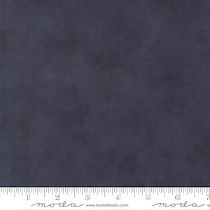 May include: A solid navy blue fabric with a subtle texture. The fabric is displayed with a ruler along the bottom edge, showing measurements in inches. The fabric appears to be cotton or a similar material, suitable for quilting or apparel.