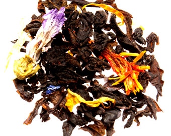 May include: A blend of black tea leaves, dried flowers, and fruit pieces. The tea blend includes purple, blue, yellow, and orange flower petals.