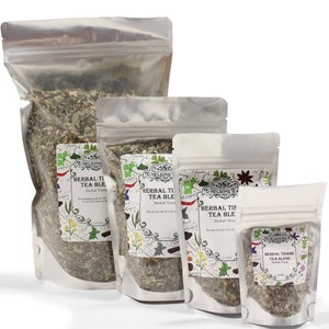 May include: Four silver resealable bags of loose leaf herbal tea blend. The bags are labeled "The Nelson's Tea Herbal Tea Blend" and feature a floral design. The bags are arranged in order of size from largest to smallest.