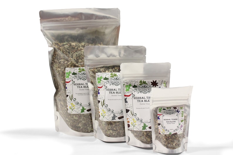 May include: Four silver resealable bags of loose leaf herbal tea blend. The bags are labeled "The Nelson's Tea Herbal Tea Blend" and feature a floral design. The bags are arranged in order of size from largest to smallest.